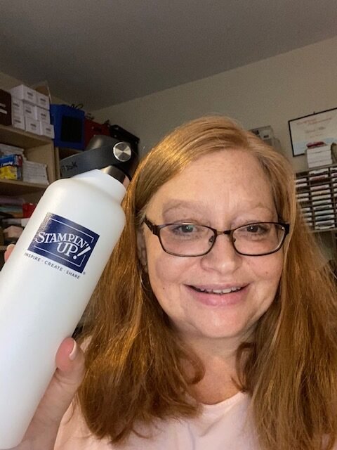 Photo of Brenda Miller holding up Stampin Up Water Bottle