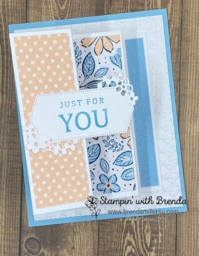 Light blue and white card with fun fold in a vertical Z with 3 Regency Park patterned papers from Stampin' Up! on each of the front facing panels along with a "Just for You" tag on cover panel