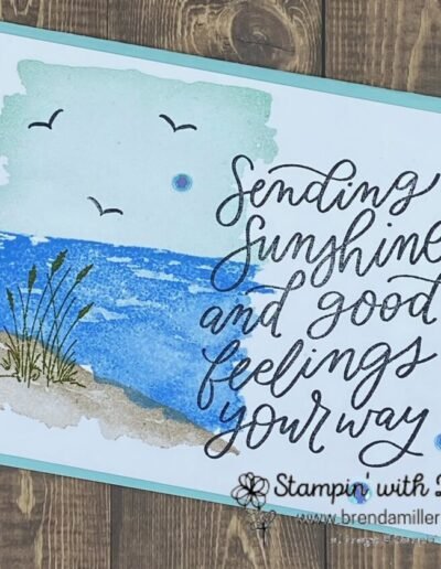 Oceanfront stamps from Stampin Up create a mini beach scene with sand, water and sky in shades of blue