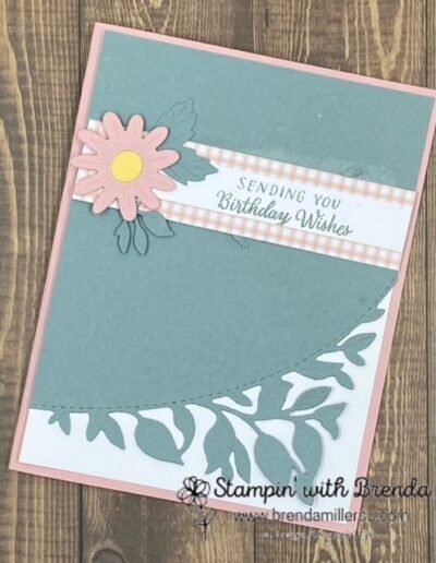 Pink and Green card with Around the Bend dies from Stampin' Up! including leaves in bottom right corner and flower with leaves next to Sending You Birthday Wishes sentiment