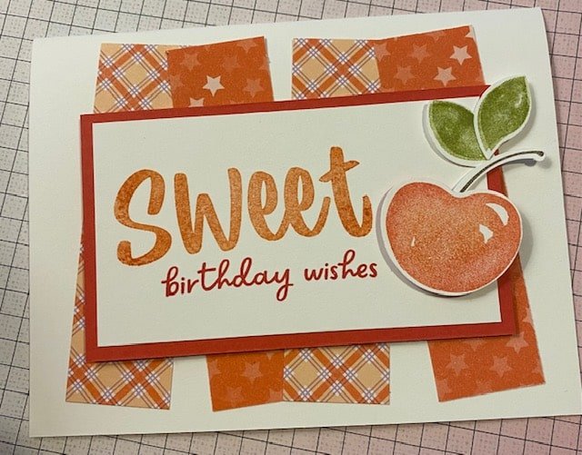 Sweetest cherries birthday card with one cherry and 4 strips of DSP as background in calypso coral and sweet sorbet