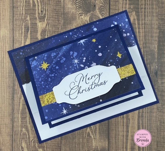 Stars at Night card with O Holy Night DSP with a simple fun fold small card folded on top of a navy base with Merry Christmas sentiment and gold stars
