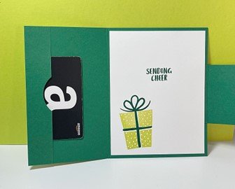 Inside of gift card holder with pocket for gift card on left side and a white panel for message and gift stamp on right side