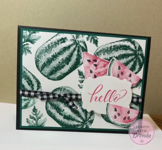 stampin' up! watercolor melon stamps in green in background with slices of watermelon around a hello greeting