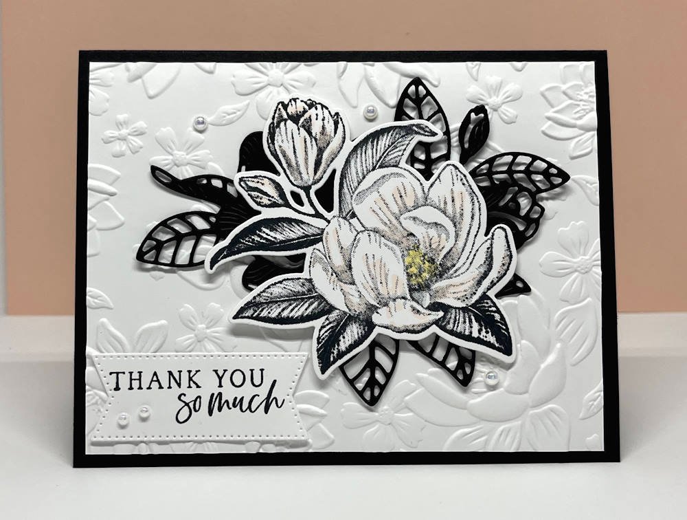 Stampin' Up! Magnolia Mood bundle in black & white with magnolia flower on a floral embossed background